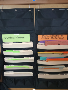a file holder with folders and papers on it. An example of Mrs. Stutz's classroom. 